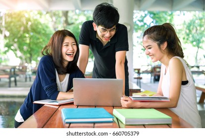 Students Asian Together Group Teenager Studying Smile With Laptop Computer, School Folders Reading Book At University Campus College Knowledge Center For Study Learning Bright Idea In Summer Holiday. 