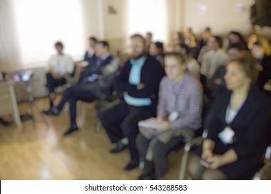 Students in the audience. Blurred background