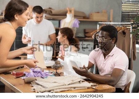 Students communicate during practical classes at cutting and sewing courses, discuss results of work, demonstrate fabric pattern. Retraining, profession change and training............