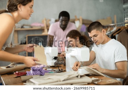 Students communicate during practical classes at cutting and sewing courses, discuss results of work, demonstrate fabric pattern. Retraining, profession change and training............