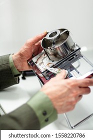 Students In A Digital Forensics Class Take Apart Broken Hard Disk Drives