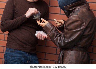 Students exchanging selected type of drugs for money