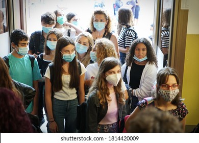 Students with face mask back at school after covid-19 quarantine and lockdown. Turin, Italy - September 2020