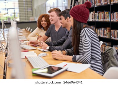 Students, friends and library with computer at university for education, learning or discussion on project. College, online and diverse learners for scholarship, knowledge or working on assignment - Powered by Shutterstock