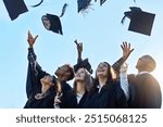 Students, group and throw graduation cap for celebration, success and happy with goals at university. People, friends and excited with mortarboard in air at event, education and cheers at college