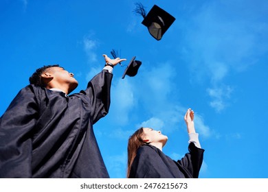 Students, happy and graduation cap in sky on campus with celebration and success People, college and university classmate or friends with smile or happy for qualification competition and excited - Powered by Shutterstock