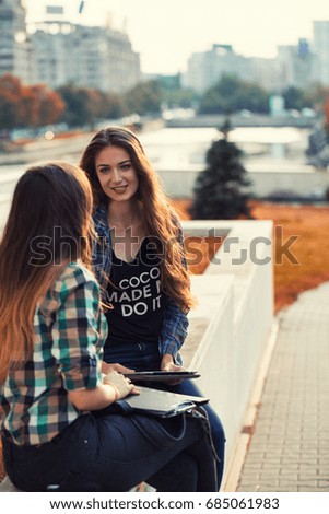 Students having a chat. After class fun time. Back to school concept.