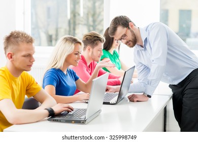 Students At The Informatics And Programming Lesson 