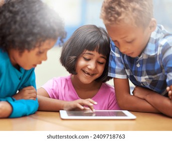 Students, kids learning and tablet in classroom for online education, video streaming and information in group. Happy children with digital technology and scroll for knowledge and school development - Powered by Shutterstock