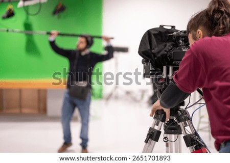 Students learning in a TV Studio set. High quality photo