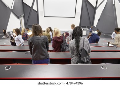 Students Leaving University Lecture Theatre, Back View