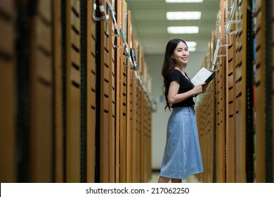 Students in Library - Powered by Shutterstock