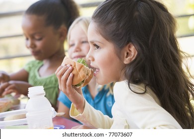 Students Outdoors Eating Lunch (selective Focus)