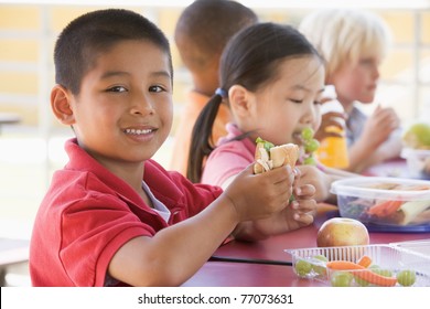 Students Outdoors Eating Lunch (selective Focus)