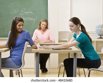 Students Passing Notes In Classroom