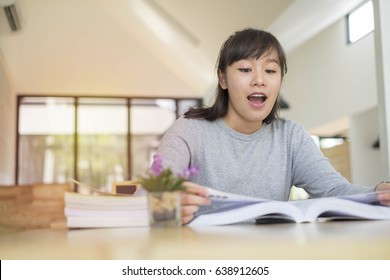 Students Read Aloud With Book