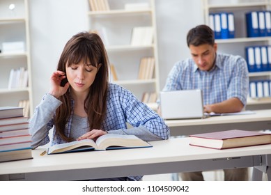 Students sitting and studying in classroom college - Shutterstock ID 1104509042