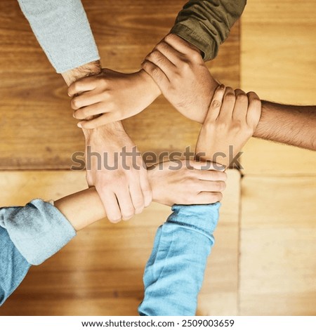 Students, study and holding hands for support, people and university exam with collaboration in top view. Friends, trust and teamwork on campus for college, education and community or social society