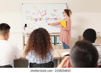 Students studying English grammar at language school