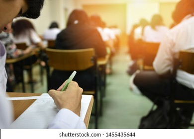 Students taking admission test in exam room at high school, college, or university, education or academic concept picture of professional or vocational learners in training session, selective focus - Shutterstock ID 1455435644