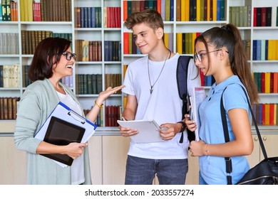 Students Teenagers Talking With Woman Teacher Mentor