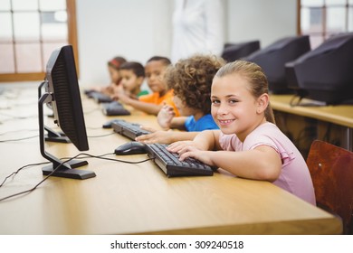 Students using computers in the classroom at the elementary school