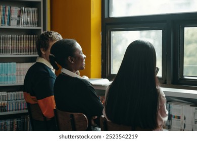 Students Using Digital Tablet In The Library - Powered by Shutterstock