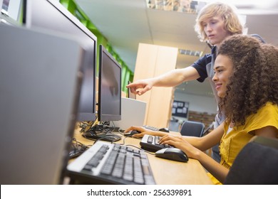 Students working on computer in classroom at the university