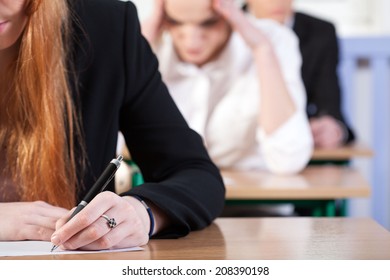 Students Writing An Exam At University, Horizontal