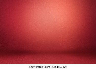 Studio Background, Backdrop With Wall And Floor. Light Spot On A Red Fabric Background.