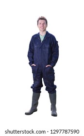 Studio cut out of farmer in overalls on white background smiling at camera