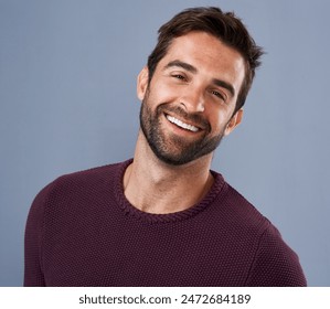 Studio, face and smile of man, fashion and confidence in mockup space, pride and cardigan in winter. Blue background, portrait and person in Miami, happy and comfortable in clothes, joy and jersey - Powered by Shutterstock