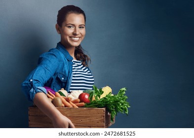 Studio, farmer or woman in portrait with vegetables, nutrition and fresh products in basket by mockup. Small business, organic or harvest with female supplier, agriculture and food by gray background - Powered by Shutterstock