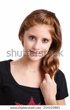Studio fashion portrait of young beautiful smiling girl with nice eyes on white background