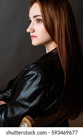 Studio Female Potrait In Lather Jacket