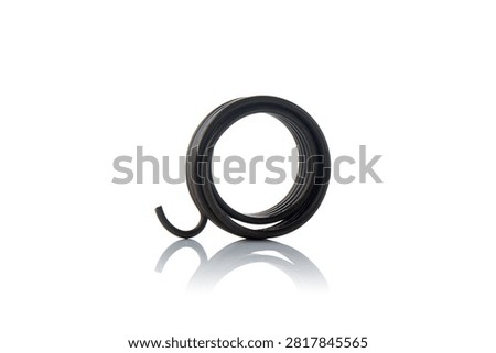 Studio front perspective view of heavy duty black coated steel kickstart return torsion spring featuring coiled wire loops, hooked anchoring end, shot on reflective white background showcasing scooter engine starting mechanism hardware.