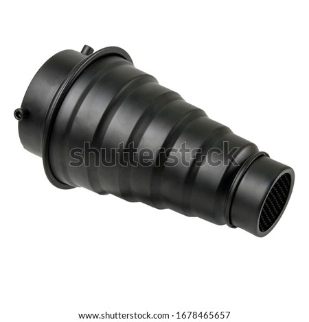 A studio light accessories called Snoot which is usually used so that the light is more directed towards the object, Snoot is usually used in front of the flash.