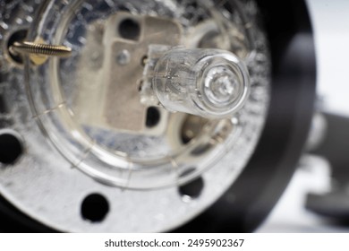 Studio light flash lamp closeup on white background isolated