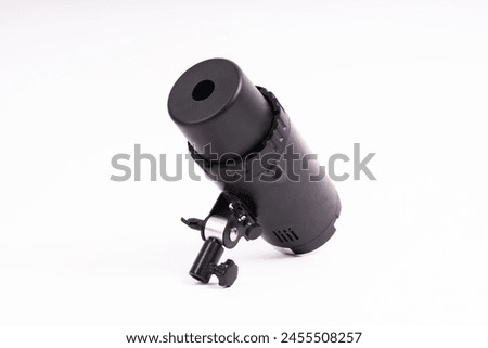 Studio light flash lamp closeup on white background isolated