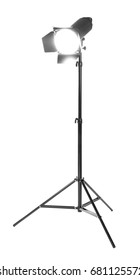 Studio Lighting On A Tripod Stand, Isolated On A White Background. Professional Studio Equipment. Searchlight For Cinema. Making Movie Single Icon In Black Style Bitmap. 