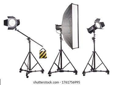 Studio Lighting Stands With Flash And Softbox Isolated On The White Background. Elements Of Professional Photography Equipment.