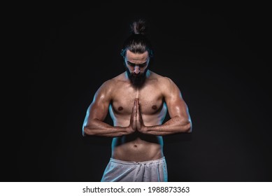 Studio Lowkey Portrait Of A Powerful Muscular Man. Abstract Conceptual Photo O A Balancing Physical And Mental Strength.