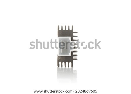 Studio macro close up of motorcycle voltage regulator rectifier featuring black cast aluminum heat sink fins, white plastic four pin socket connector, front view, and soft mirror reflection, isolated on pure white background for auto parts mockup.