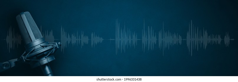 Studio microphone with audio  waveform on blue background. Podcast or radio broadcast banner with copy space
