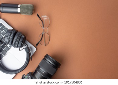 Studio Microphone, Headphones And Laptop, Camera And Glasses. Top View, Blogger Or Streamer With Space