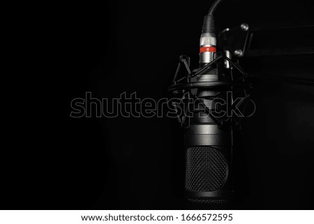 Studio microphone on a black background