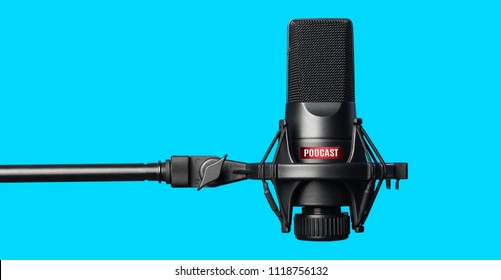 Studio microphone for recording podcasts over blue background - Shutterstock ID 1118756132