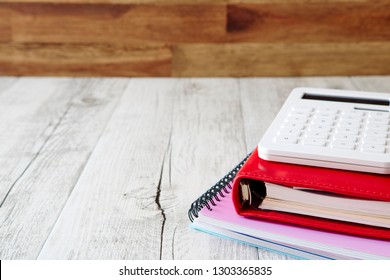 A studio photo of a business calculator - Shutterstock ID 1303365835