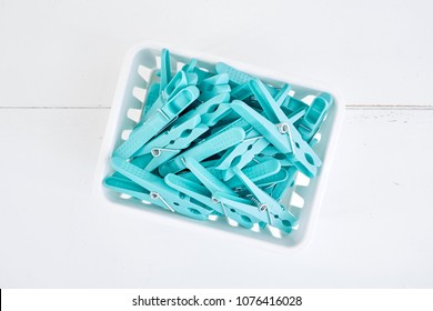 A studio photo of clothes line pegs
