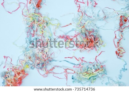 A studio photo of colorful streamers